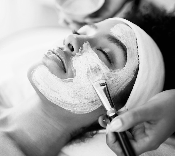 Shot of an attractive young woman getting a facial at a beauty spa